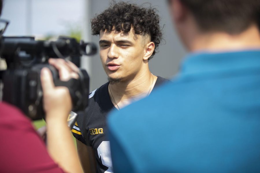 Iowa+wide+receiver+Arland+Bruce+interacts+with+the+media+during+Hawkeye+Football+Media+Day+at+the+Iowa+Football+practice+facility+in+Iowa+City+on+Aug.+12%2C+2022.+
