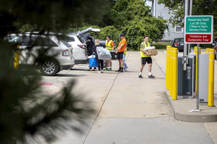 Students are seen moving into Parklawn Residence Hall in Iowa City on Monday, Aug. 11, 2022.