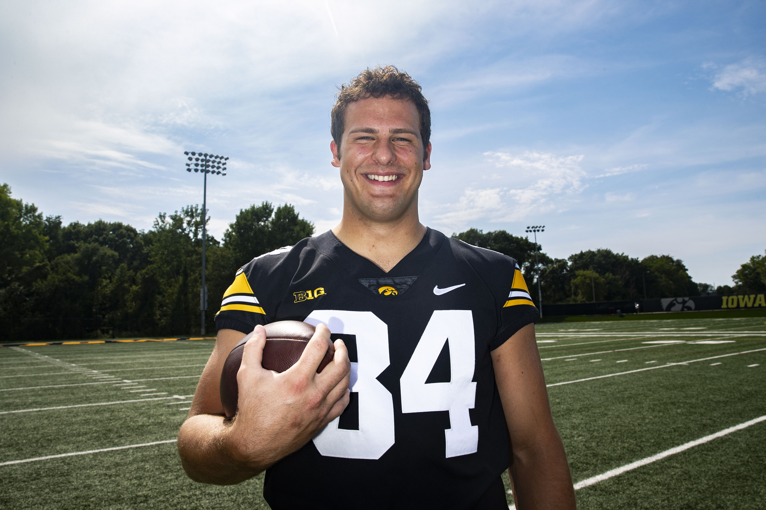 LOOK: Iowa starting quarterback chops off long hair for charity 