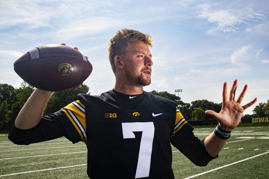 Iowa quarterback Spencer Petras poses for a portrait during Iowa football media day at Iowa football’s practice facility on Friday, Aug. 12, 2022. During media days, Petras said the team is excited to compete this season. “You never know how good a team is going to be until you get there and the bullets are rallying flying,” Petras said. “I am proud of the guys for how we have done so far.” 