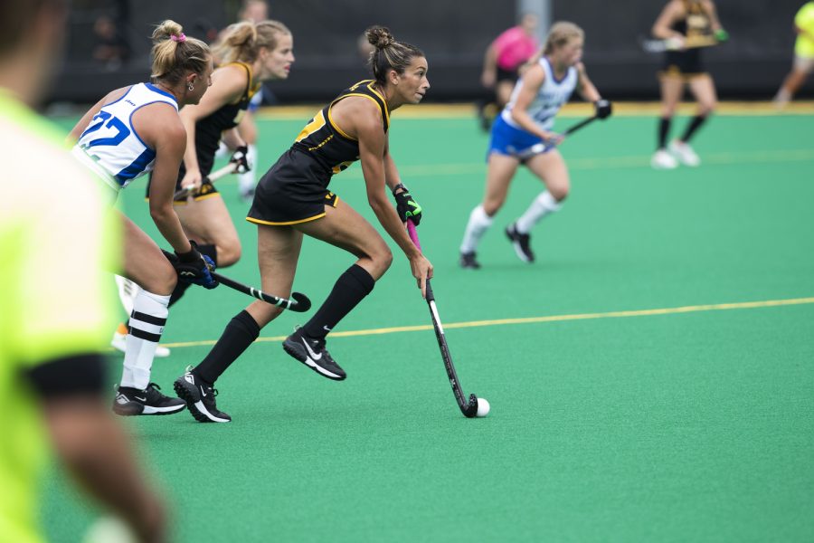 Iowa forward Ciara Smith moves the ball in bounds during a field hockey game between Iowa and St. Louis at Grant Field in Iowa City on Sunday, Sept.4, 2022. The Hawkeyes defeated the Billikens, 6-0. Smith scored two goals and recorded one assist.