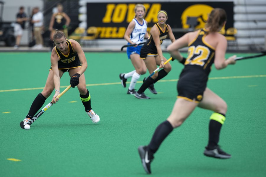 Iowa midfielder Esme Gibson moves the ball during a field hockey game between Iowa and St. Louis at Grant Field in Iowa City on Sunday, Sept.4, 2022. The Hawkeyes defeated the Billikens, 6-0. Gibson recorded two assists.