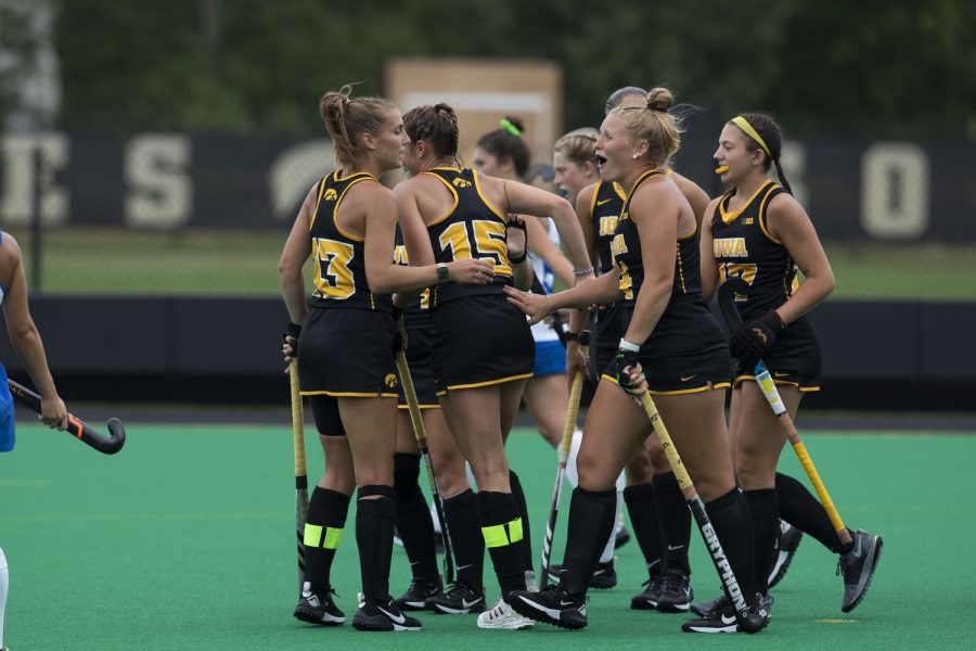 Iowa player Alex Wesneski high fives teammates after scoring a goal during a field hockey game between Iowa and St. Louis at Grant Field in Iowa City on Sunday, Sept.4, 2022. The Hawkeyes defeated the Billikens, 6-0. Wesneski scored two goals and played 26 minutes.