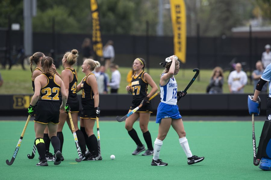 St.Louis defender Lauren Pendergast takes off her mask after Iowa scores a goal during a field hockey game between Iowa and St. Louis at Grant Field in Iowa City on Sunday, Sept.4, 2022. The Hawkeyes defeated the Billikens, 6-0. Pendergast played 60 minutes.