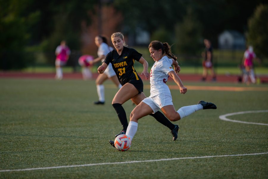 Midfielder+Mira+Emma+kicks+ball+down+field+as+Iowa+midfielder+Addie+Bundy+looks+on+during+a+soccer+game+at+the+Cyclone+Sports+Complex+in+Ames%2C+Iowa%2C+on+Thursday%2C+Sept.+8%2C+2022.+The+Cyclones+defeated+the+Hawkeyes+2-1.