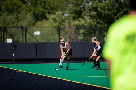 Iowa forward Alex Wesneski handles the ball downfield during a field hockey game between Iowa and Providence at Grant Field in Iowa City on Sunday, Sept. 9, 2022. The Hawkeyes defeated the Friars, 3-1.