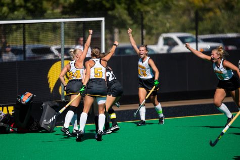 Iowa celebrates a goal made by Olivia Frazier and assisted by Sofie Stribos during a field hockey game between Iowa and Providence at Grant Field in Iowa City on Sunday, Sept. 9, 2022. The Hawkeyes defeated the Friars, 3-1.