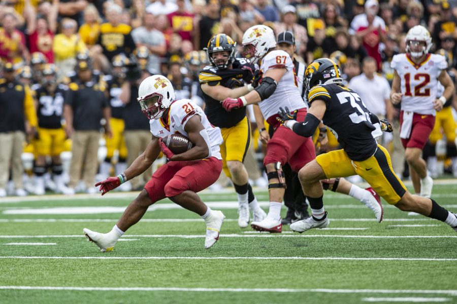 Iowa State running back Jirehl Brock carries the ball during the Cy-Hawk football game between Iowa and Iowa State at Kinnick Stadium on Saturday, Sept. 10, 2022. The Cyclones ended a six-game Cy-Hawk series losing streak and defeated the Hawkeyes, 10-7. Brock carried the ball for 100 yards.