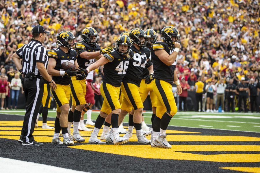 Iowa defense celebrates a fumble during a football game between Iowa and Iowa State at Kinnick Stadium in Iowa City on Saturday, Sept. 10, 2022. The Cyclones ended a six-game Cy-Hawk series losing streak and defeated the Hawkeyes, 10-7. Iowa State had three turnovers.