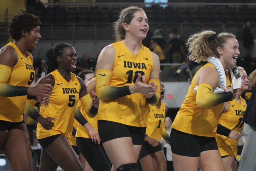 The Iowa volleyball team celebrates after their win during a volleyball match between Iowa and Northern Iowa at Xtream Arena in Coralville on Saturday, Sept. 17, 2022. The Hawkeyes defeated the Panthers 3-0.