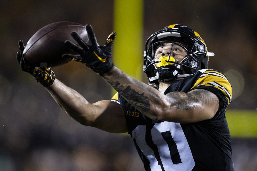 Iowa wide receiver Arland Bruce IV catches a touchdown pass during a football game between Iowa and Nevada at Kinnick Stadium in Iowa City on Saturday, Sept. 17, 2022.