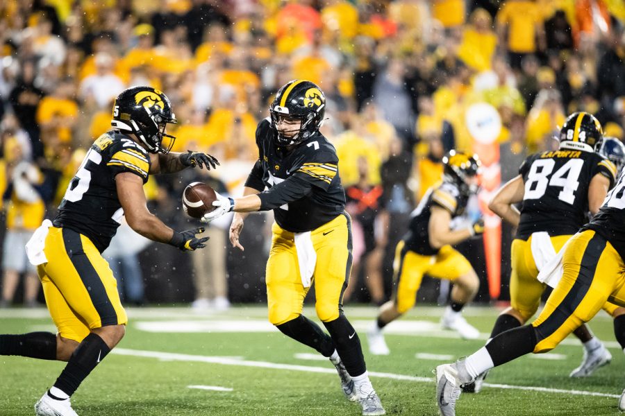 Iowa+quarterback+Spencer+Petras+hands+the+ball+off+to+running+back+Gavin+Williams+during+a+football+game+between+Iowa+and+Nevada+at+Kinnick+Stadium+in+Iowa+City+on+Saturday%2C+Sept.+17%2C+2022.+Williams+rushed+for+57+yards+on+16+carries.+The+Hawkeyes+defeated+the+Wolf+Pack%2C+27-0.