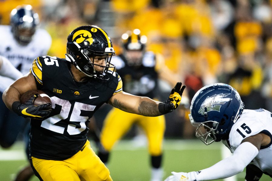 Iowa+running+back+Gavin+Williams+runs+with+the+ball+during+a+football+game+between+Iowa+and+Nevada+at+Kinnick+Stadium+in+Iowa+City+on+Saturday%2C+Sept.+17%2C+2022.+Williams+rushed+for+57+yards+on+16+carries.+The+Hawkeyes+defeated+the+Wolf+Pack%2C+10-7.