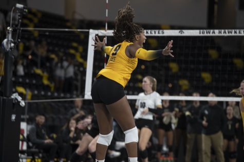 Iowa middle hitter Amiya Jones celebrating a point during a volleyball game between Iowa and Purdue at Xtream Arena in Coralville, Iowa, on Sunday, Sept. 25, 2022. The Boilermakers defeated the Hawkeyes 3-1.  Urquhart had ten kills during the match.