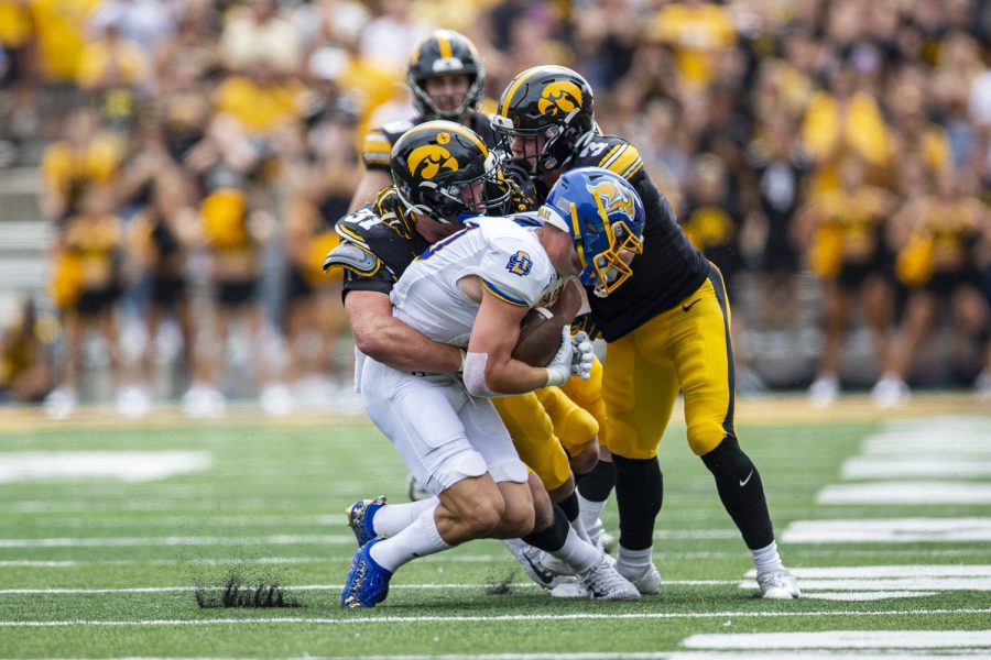 Iowa+defenders+Jack+Campbell+and+Cooper+DeJean+tackle+South+Dakota+State+wide+receiver+Jaxon+Janke+during+a+football+game+between+Iowa+and+South+Dakota+State+at+Kinnick+Stadium+on+Saturday%2C+Sept.+3%2C+2022.+The+Hawkeyes+defeated+the+Jackrabbits%2C+7-3.+Campbell+had+one+quarterback+hurry.