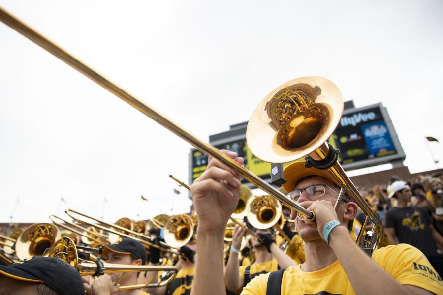 A trombonist from the Iowa Hawkeye Marching Band performs during a football game between Iowa and South Dakota State at Kinnick Stadium on Saturday, Sept. 3, 2022. The Hawkeyes defeated the Jackrabbits, 7-3.