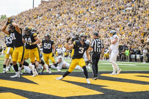 Iowa defensive back Cooper DeJean celebrates after Iowa linebacker Jack Campbell got a safety during a football game between Iowa and South Dakota State at Kinnick Stadium on Saturday, Sept. 3, 2022. The Hawkeyes defeated the Jackrabbits, 7-3.