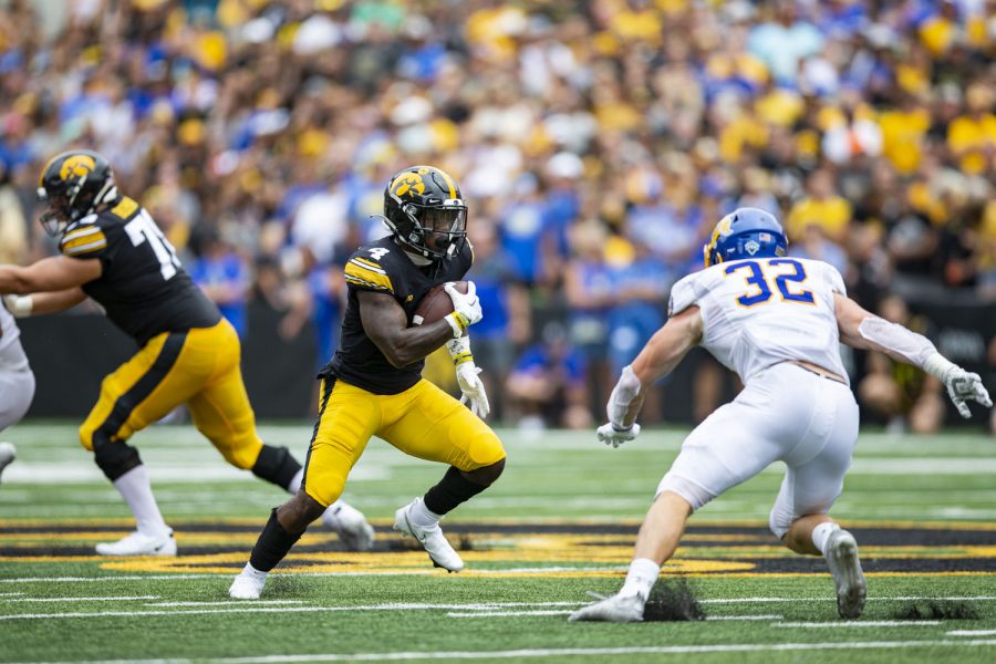 Iowa running back Leshon Williams carries the ball during a football game between Iowa and South Dakota State at Kinnick Stadium on Saturday, Sept. 3, 2022. The score at halftime was tied, 3-3.