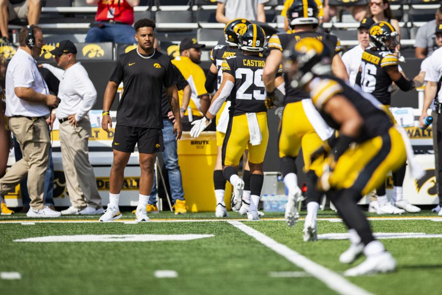 Iowa running back Gavin Williams high-fives teammates during a football game between Iowa and South Dakota State at Kinnick Stadium on Saturday, Sept. 3, 2022. Williams was expected to start today, but is dealing a reported ankle injury.