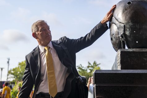 Iowa football head coach Kirk Ferentz touches the Nile Kinnick statue during the Hawk Walk before a football game between Iowa and South Dakota State at Kinnick Stadium on Saturday, Sept. 3, 2022. The Hawkeyes are favored to win the game. 