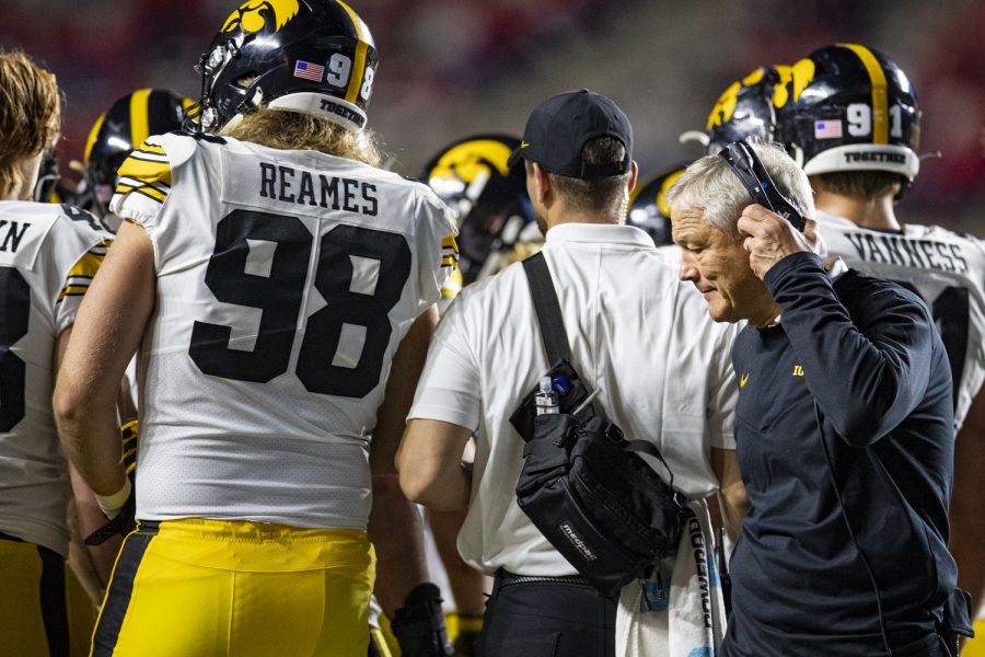 Iowa football head coach Kirk Ferentz adjusts his headset during a football game between Iowa and Rutgers at SHI Stadium in Piscataway, N.J. on Saturday, Sept. 24, 2022. The Hawkeyes defeated the Scarlet Knights 27-10.