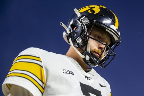 Iowa quarterback walks onto the field before a football game between Iowa and Rutgers at SHI Stadium in Piscataway, N.J. on Saturday, Sept. 24, 2022. The Hawkeyes defeated the Scarlet Knights 27-10. 