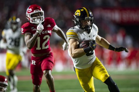 Iowa defensive back Cooper DeJean runs the ball back for a pick-six during a football game between Iowa and Rutgers at SHI Stadium in Piscataway, N.J. on Saturday, Sept. 24, 2022. The Hawkeyes lead the Rutgers 17-3 at halftime. 