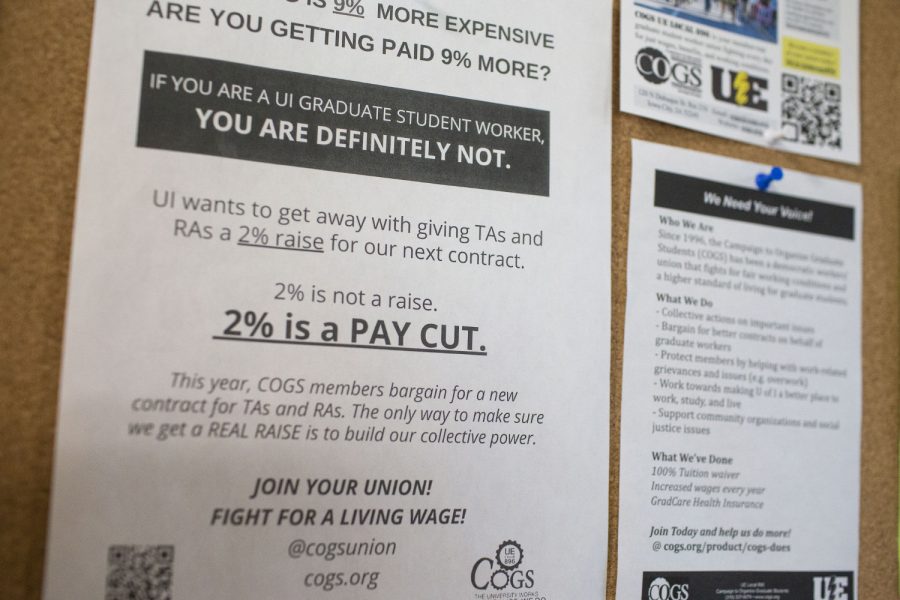 Poster put up by the University of Iowa COGS at North Hall in Iowa City is seen on Sept. 29, 2022.