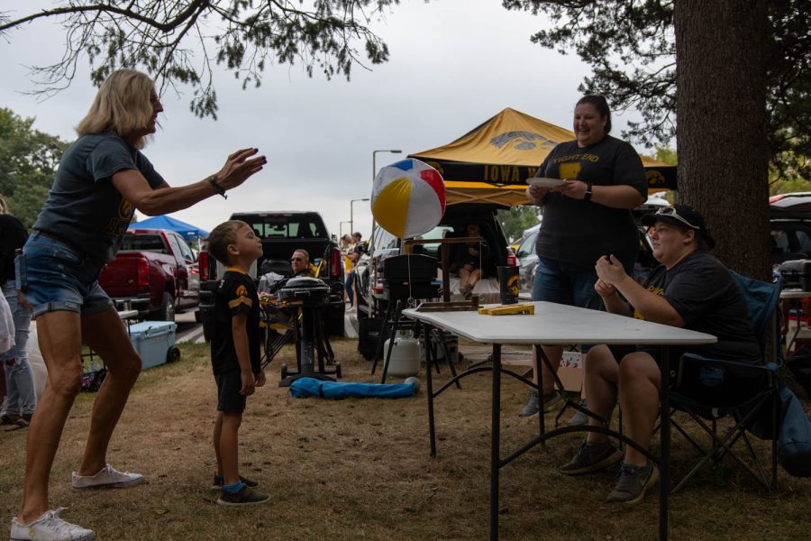 Hawkeye fans play mini games at a tailgating lot in Iowa City, Iowa, on Saturday, Sept. 10, 2022 for the Iowa vs. Iowa State football game.