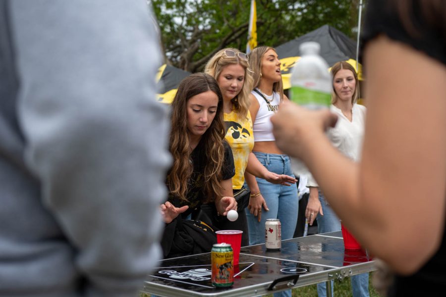 Hawkeye fans play boom cup at a tailgating lot in Iowa City, Iowa, on Saturday, Sept. 10, 2022 for the Iowa vs. Iowa State football game.