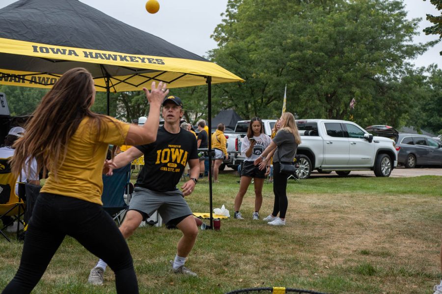 Hawkeye fans play spike ball at a tailgating lot in Iowa City, Iowa, on Saturday, Sept. 10, 2022 for the Iowa vs. Iowa State football game.