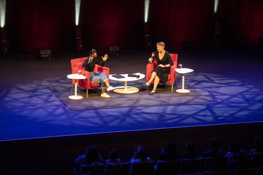 Three-time Olympic gold medalist Gabby Douglas talks with moderator Charity Nebbe during An Evening with Gabby Douglas put on by the UI Lecture Committee at Hancher Auditorium on Thursday, Sept. 1.
