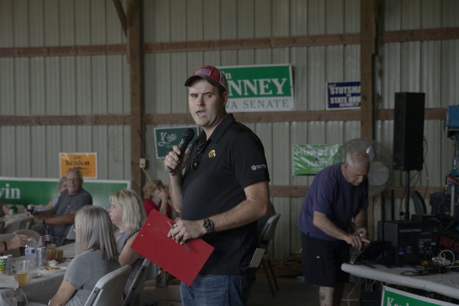 Iowa State Senator Zach Wahls speaks Campaign volunteer Dominic Patathie guides parking during the Kinney Summer BBQ Bash at the Kinney Family Farm in Oxford, Iowa on Saturday, Aug. 27, 2022. Democratic candidate Kevin Kinney, D-Iowa, is running for Iowa Senate, District 39.