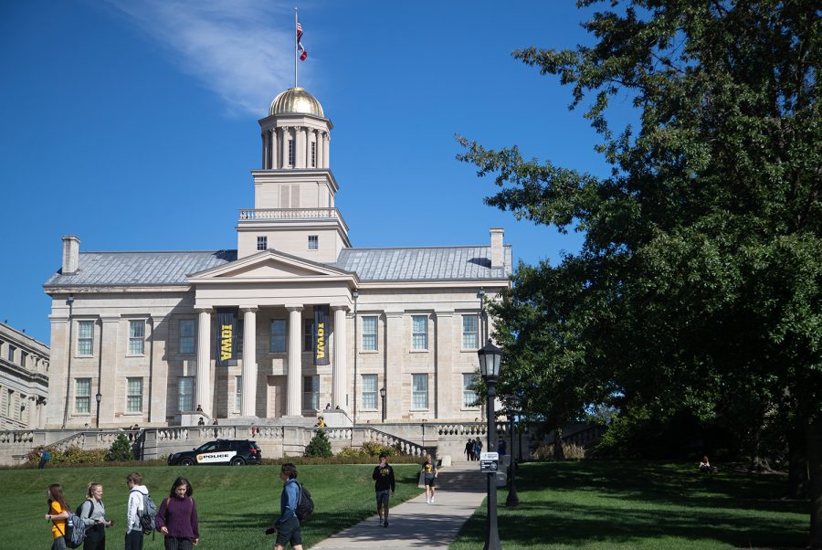 A police car is seen in front of the Old Capitol building at the University of Iowa on Sept. 22, 2022.