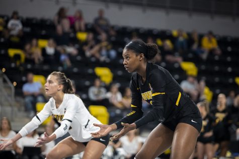 Iowa outside hitter Nia Washington prepares for North Florida’s serve during a volleyball game between Iowa and North Florida at Xtream Arena in Coralville on Friday, Sept. 16, 2022. Washington had one kill.The Hawkeyes defeated the Ospreys 3-0.