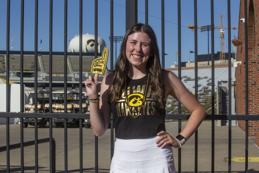 Anaka Sanders poses in game day gear in front of Kinnick Stadium on Wednesday, Aug. 31, 2022. 