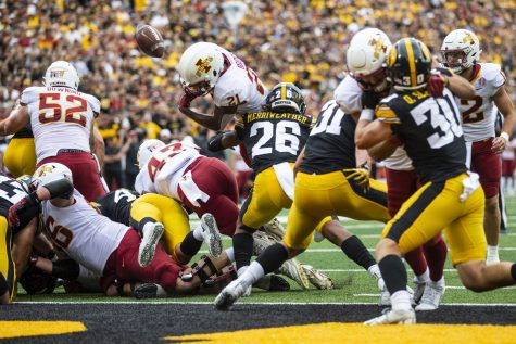 Iowa State running back Jirehl Brock fumbles the ball during a football game between Iowa and Iowa State at Kinnick Stadium in Iowa City on Saturday, Sept. 10, 2022.