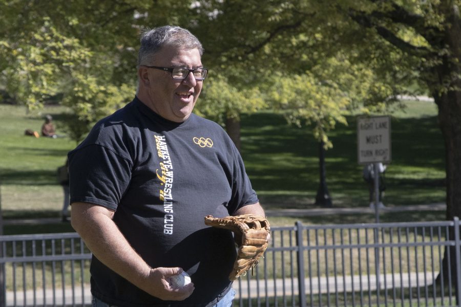 Johnson County Supervisor Rod Sullivan smiles during a game of catch in Hubbard Park on Wednesday, Sept. 28, 2022.