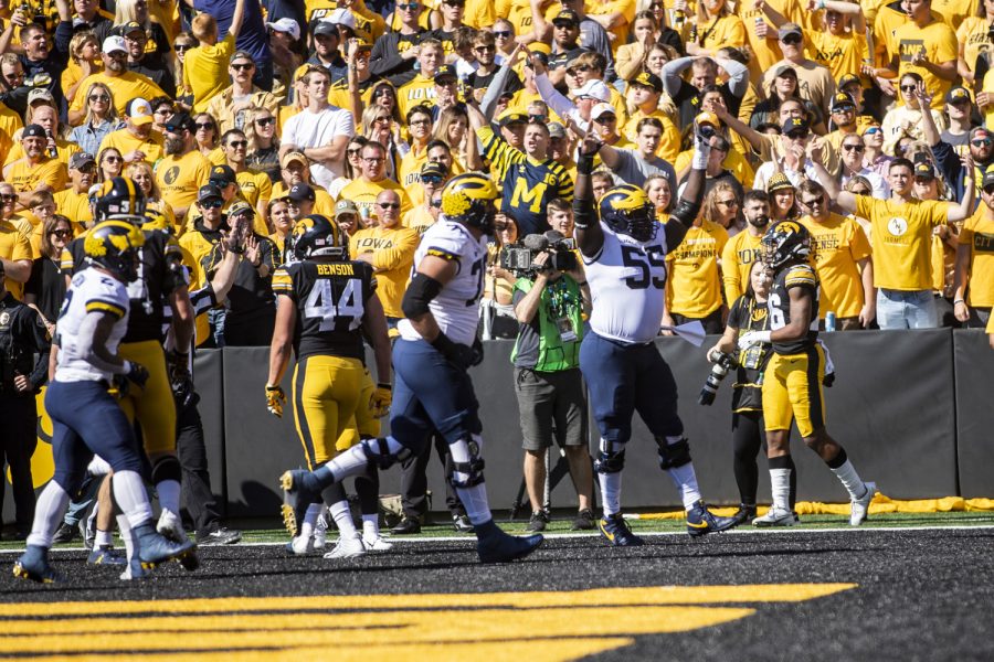 Michigan celebrates a touchdown during a football game between Iowa and No. 4 Michigan at Kinnick Stadium in Iowa City on Saturday, Oct. 1, 2022.