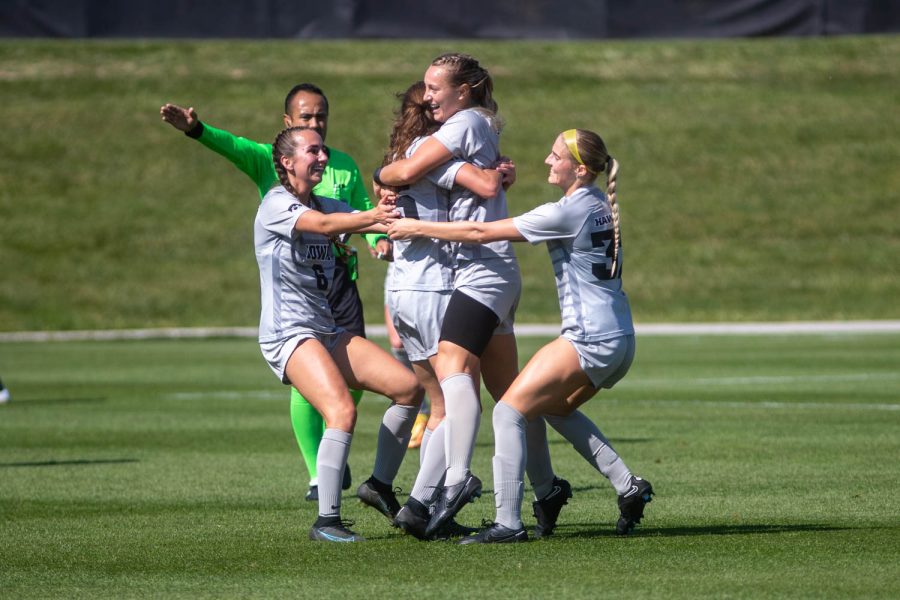 Iowa+midfielder+Caroline+Halonen+goes+in+to+celebrate+with+teammates+after+a+goal+scored+by+Iowa+forward+Hailey+Rydberg+during+a+soccer+game+between+Iowa+and+Michigan+at+the+University+of+Iowa+Soccer+Complex+in+Iowa+City+on+Sunday%2C+Oct.+2%2C+2022.+The+Hawkeyes+and+Wolverines+tied%2C+1-1.