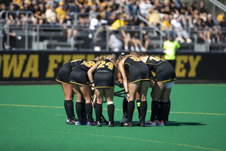 The Hawkeyes huddle up during a field hockey game between Iowa and Rutgers at Grant Field in Iowa City on Sunday, Oct. 2, 2022. The Iowa Hawkeyes defeated the Rutgers Scarlet Knights, 1-0.