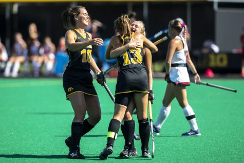 Iowa forward Leah Zellner celebrates with teammates after scoring a goal during a field hockey game against Rutgers at Grant Field in Iowa City on Oct. 2, 2022. The Iowa Hawkeyes defeated the Rutgers Scarlet Knights, 1-0.