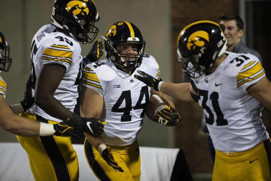 Iowa+linebacker+Seth+Benson+recovers+a+fumble+during+a+football+game+between+Iowa+and+Illinois+at+Memorial+Stadium+in+Champaign%2C+Ill.%2C+on+Saturday%2C+Oct.+8%2C+2022.+The+Fighting+Illini+defeated+the+Hawkeyes%2C+9-6.+Benson+recovered+the+fumble+in+the+first+half.