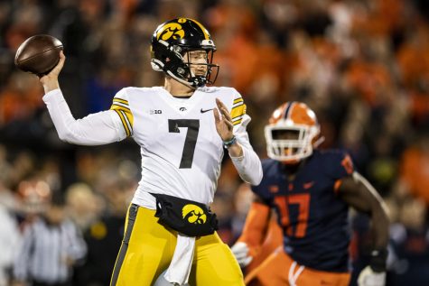 Iowa quarterback Spencer Petras throws a pass during a football game between Iowa and Illinois at Memorial Stadium in Champaign, Ill., on Saturday, Oct. 8, 2022. The Fighting Illini defeated the Hawkeyes, 9-6. Petras averaged 4.7 yards per pass.