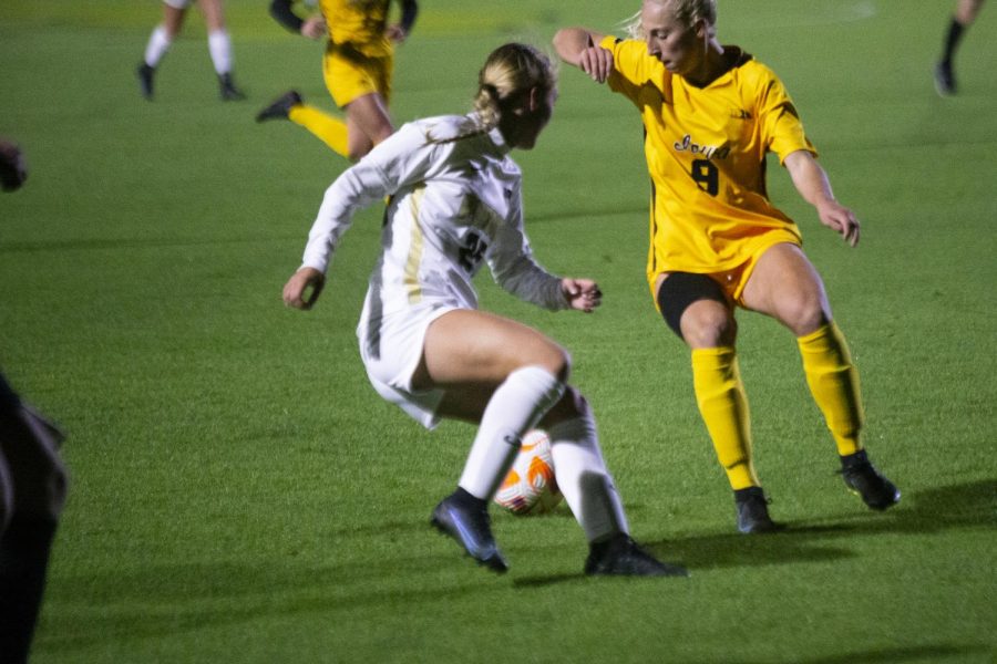 Iowa+soccer+defender+Samantha+Cary+looks+to+gain+possession+of+the+ball+against+Purdue+on+Thursday%2C+October+13%2C+2022.+Iowa+and+Purdue+tied%2C+2-2.