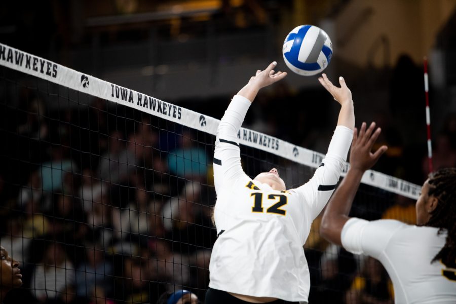 Iowa setter Bailey Ortega sets the ball during a volleyball match between Iowa and Penn State at Xtream Arena in Coralville on Friday, October 15, 2022. The Nittany Lions defeated the Hawkeyes, 3-2.