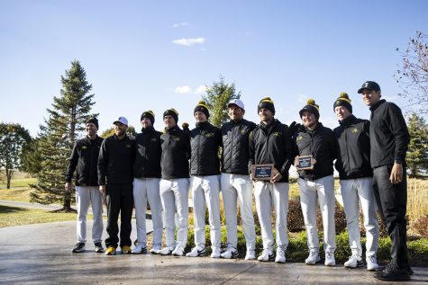 The Iowa men’s golf team poses for a picture following the Iowa Fall Classic at Blue Top Ridge Golf Course in Riverside, Iowa, on Monday, Oct. 17, 2022. The Hawkeyes defeated eight other teams to win the tournament, shooting 20 over par.