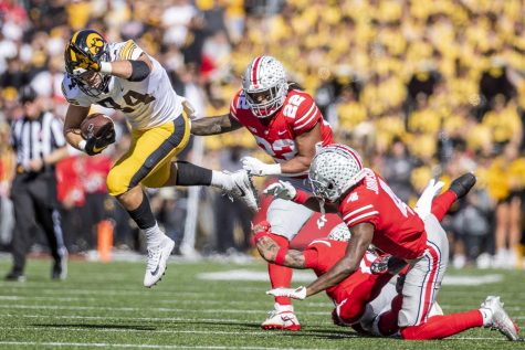 Iowa tight end Sam LaPorta jumps while running with the ball during a football game between Iowa and No. 2 Ohio State at Ohio Stadium in Columbus, Ohio, on Saturday, Oct. 22, 2022. LaPorta caught six passes for 55 yards. The Buckeyes defeated the Hawkeyes, 54-10.