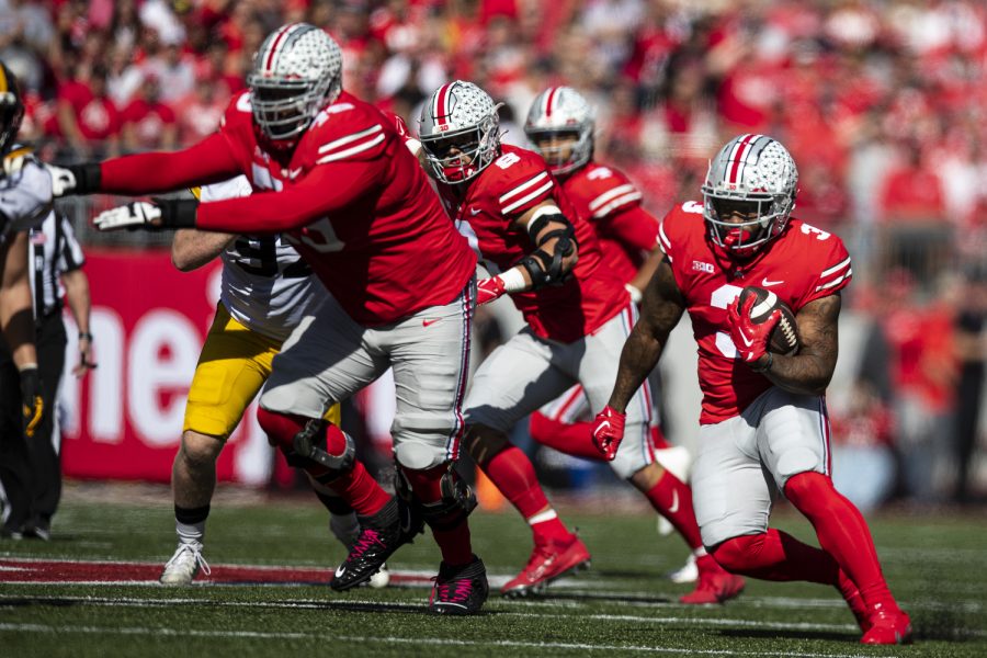 Ohio State running back Miyan Williams runs the ball during a football game between Iowa and No. 2 Ohio State at Ohio Stadium in Columbus, Ohio, on Saturday, Oct. 22, 2022. (Jerod Ringwald/The Daily Iowan)