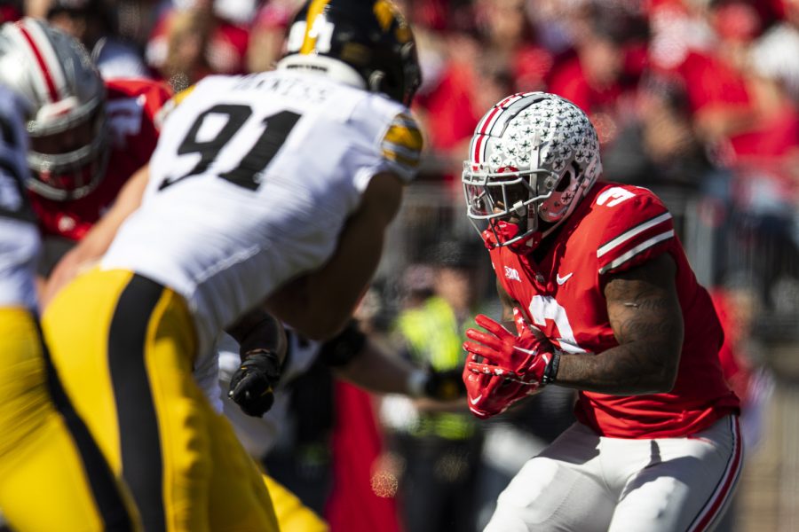 Ohio State running back Miyan Williams runs the ball during a football game between Iowa and No. 2 Ohio State at Ohio Stadium in Columbus, Ohio, on Saturday, Oct. 22, 2022. (Jerod Ringwald/The Daily Iowan)